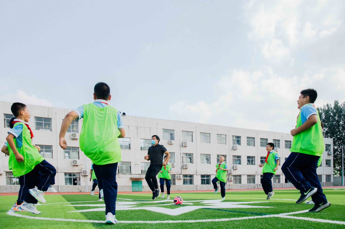 Chinese Students Play Recycled Field